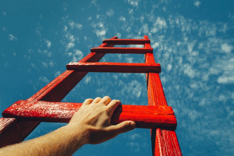 climbing a red ladder to the sky