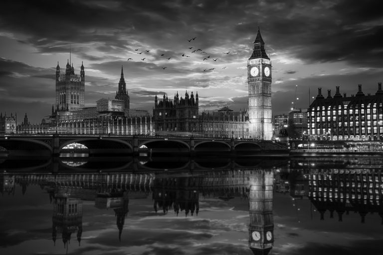 Westminster and the Big Ben clocktower by the Thames river in London