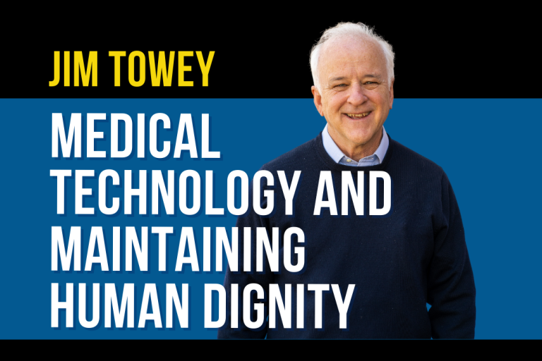 Jim Towey standing